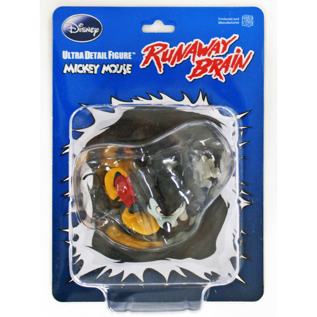 A collectible figure of Mickey Mouse in his monstrous 'Runaway Brain' form. This detailed Medicom Ultra Detail Figure (UDF) depicts Mickey crouched in a feral stance with wild black fur, glowing red eyes with intricate vein details, and sharp teeth bared. He wears his signature red shorts and oversized yellow shoes, with clawed hands reaching forward and a twisted tail extending behind him. The figure captures an intense and dynamic pose from the 'Runaway Brain' animated short.