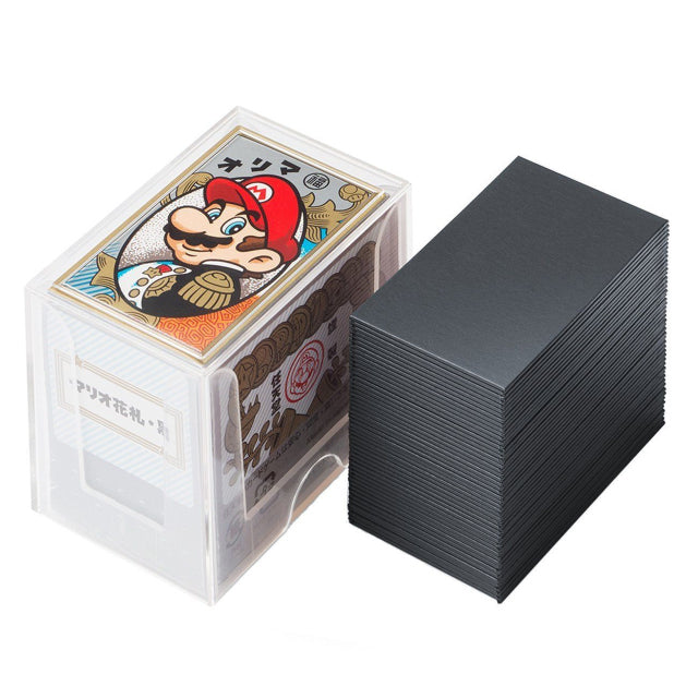 A set of Nintendo Mario-themed Japanese Hanafuda playing cards with a black backing. The clear plastic storage case features an illustration of Mario in a traditional Japanese style, wearing his iconic red hat and mustache. The design combines classic Mario imagery with traditional Hanafuda card aesthetics.